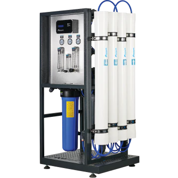 A commercial reverse osmosis water filtration system with four large white cylindrical filters, a blue vertical filter, pressure gauges, and a control panel mounted on a metal frame.