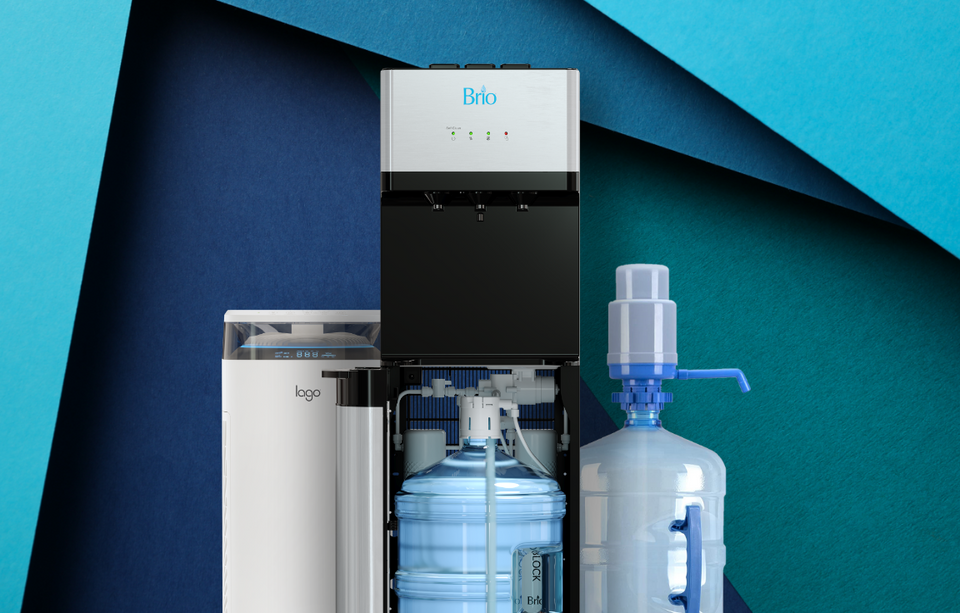 A Brio water dispenser with a large water jug, a white appliance, and an extra water bottle are displayed against a backdrop of layered blue and teal paper.