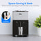 A Brio Bottleless Countertop Water Dispenser - Model 520 with a stainless-steel front dispenses hot and cold water into a glass. Text highlights its space-saving, sleek design and top load dispenser feature. An inset shows a hand replacing one of the Model 520’s stainless steel reservoirs’ filters, while a potted plant sits nearby.
