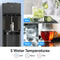 The Black Stainless Bottom Load + Water Filtration Dispenser – 520 No-Line dispenses water into a glass, with images of a cold drink, plain water, and hot tea labeled Cold, Room, and Hot to illustrate its three water temperature options.