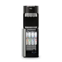 A black and silver Brio 400 Series 4-Stage Reverse Osmosis Bottleless Water Cooler stands with its lower cabinet open, showcasing four numbered advanced filtration cartridges inside.