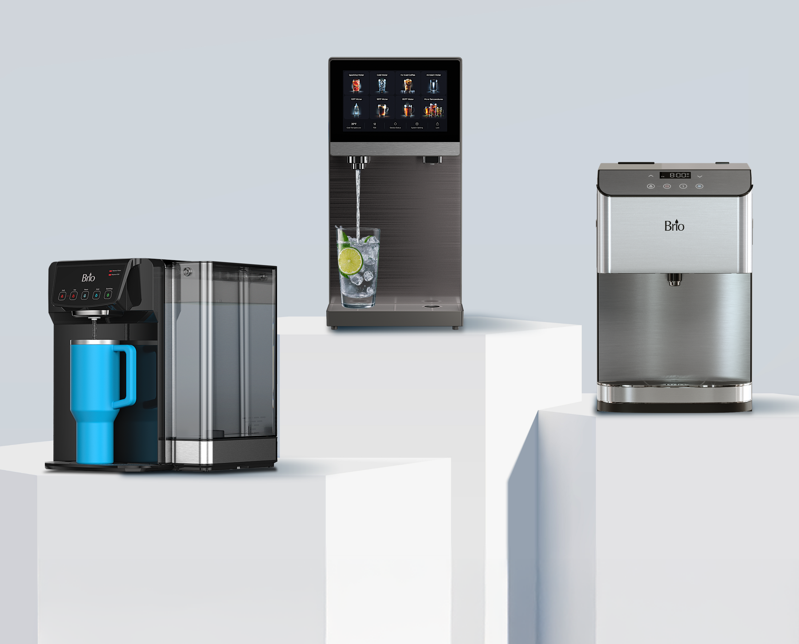 Three Brio water dispensers displayed on white podiums against a light gray background. Left: a compact black dispenser with a blue mug. Center: a modern dispenser with a touchscreen pouring water into a glass with lime and ice. Right: a stainless steel countertop dispenser with digital controls.