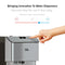 A hand adjusts the temperature on the Stainless Steel Bottleless Countertop Water Dispenser - Moderna 720, which features icons for hot and cold water and a digital display showing 62°F. Its space-saving design seamlessly fits your kitchen, while the 3-stage filtration system ensures every sip is pure and refreshing.