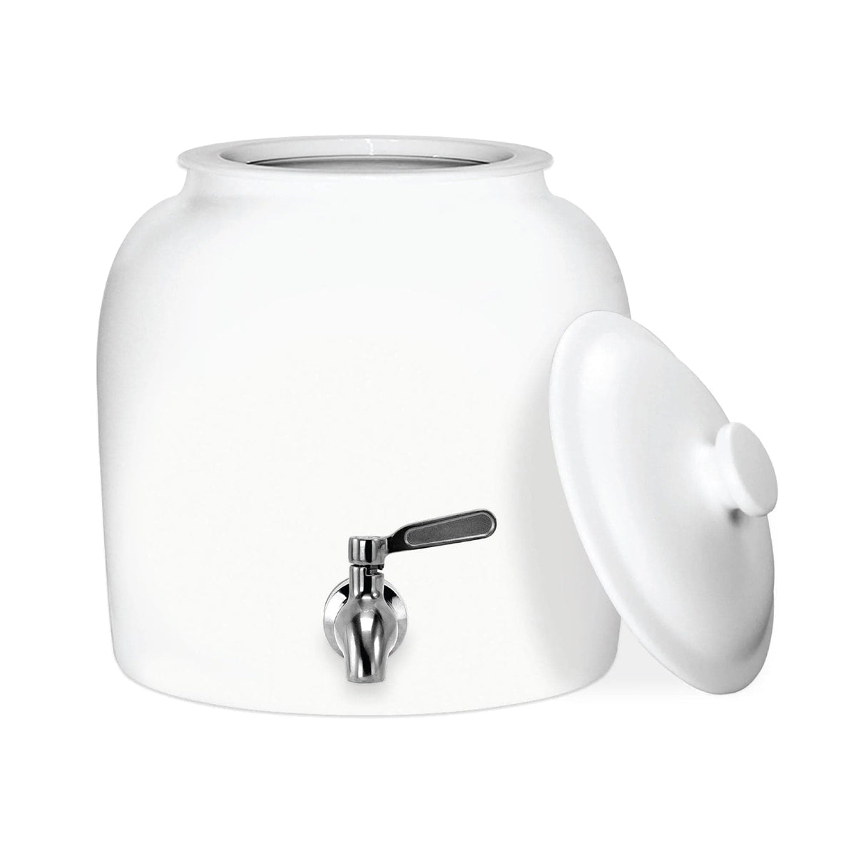 The GEO Porcelain Ceramic Crock Water Dispenser in white features a BPA-free metal spigot and includes a matching lid, shown resting beside it on a plain white background.
