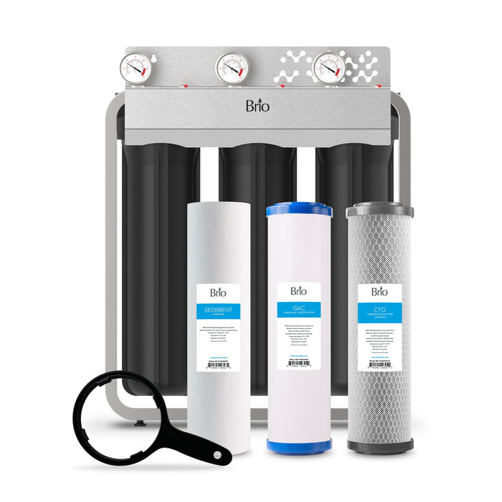 The Brio 3-Stage Whole House Filtration System - 20" Multi-Purpose features three black filter housings, top-mounted pressure gauges, sediment/GAC/CTO cartridges in front, and includes a black filter wrench for easy maintenance.