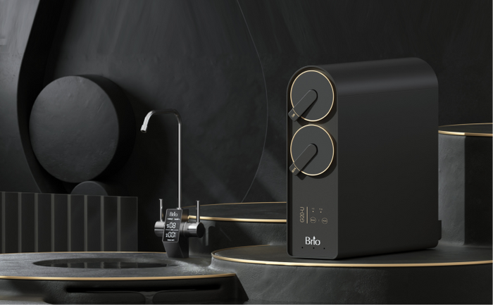Brio undersink reverse osmosis system in sleek black design with dual circular filters and digital faucet.