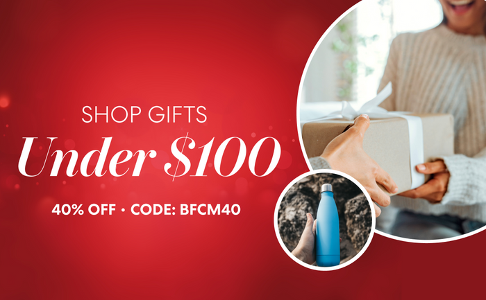 Holiday-themed Brio promotion with a red background. Text reads “Shop Gifts Under $100 – 40% Off • Code: BFCM40.” The image shows one person handing a wrapped gift to another and a blue reusable water bottle being held outdoors.