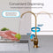 A hand washes a green apple under the Curvy Classic Series Water Faucet in Brushed Bronze, featuring a curved spout. Blue arrows highlight its 360° horizontal and 90° vertical rotation for convenient water flow.