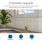 The Curvy Classic Series Water Faucet in brushed gold, made from lead-free stainless steel, is installed on a kitchen counter near a potted plant and window with hexagonal white tile backsplash. Icons show it's ideal for kitchens, wet bars, and RVs.