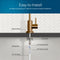 Cross-section diagram shows a Modern Series Water Faucet - Brushed Bronze installation, labeling rubber washer, locking nut, 4" threaded shank, locking clip, 1/4" quick connect, and PE tubing. Easy to install—ideal for any water filtration system.