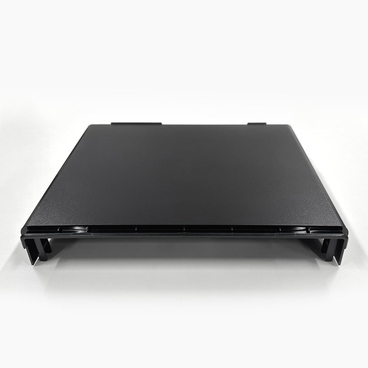 A flat, rectangular black plastic Top Cover 720 Ice Coolers tray with short raised edges on three sides, viewed from the front against a white background—compatible with CLBL720SCIC and similar models.