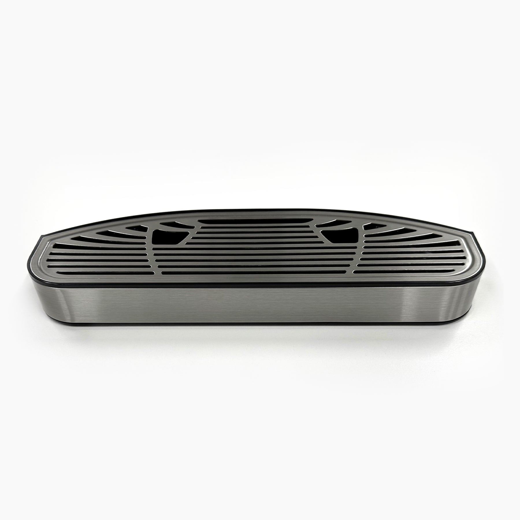 The Drip Tray 720 Ice Coolers is a rectangular stainless steel soap dish with rounded edges and a black slotted plastic top, shown on a white background.