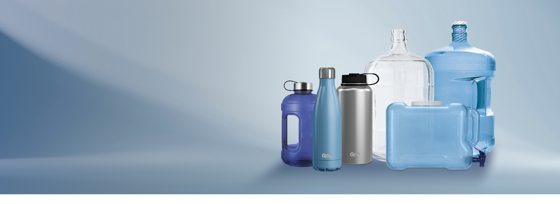 Various reusable water bottles and containers of different shapes and sizes, made of glass and plastic, are arranged on a smooth blue gradient background.
