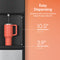 A red mug rests on the Stainless Steel Bottom Load Water Cooler - 130 Series drip tray. Text shows a 10.5" dispense height and 3.9" drip tray depth. The orange background reads “Easy Dispensing,” perfect for 5-gallon bottles.