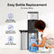 A woman slides a large water bottle into the bottom compartment of the Bottom Load Bullet Ice & Hot/Cold Water Dispenser - Model 520 Ice, with text highlighting an easy, heavy-lifting-free bottle replacement for 3- or 5-gallon bottles.