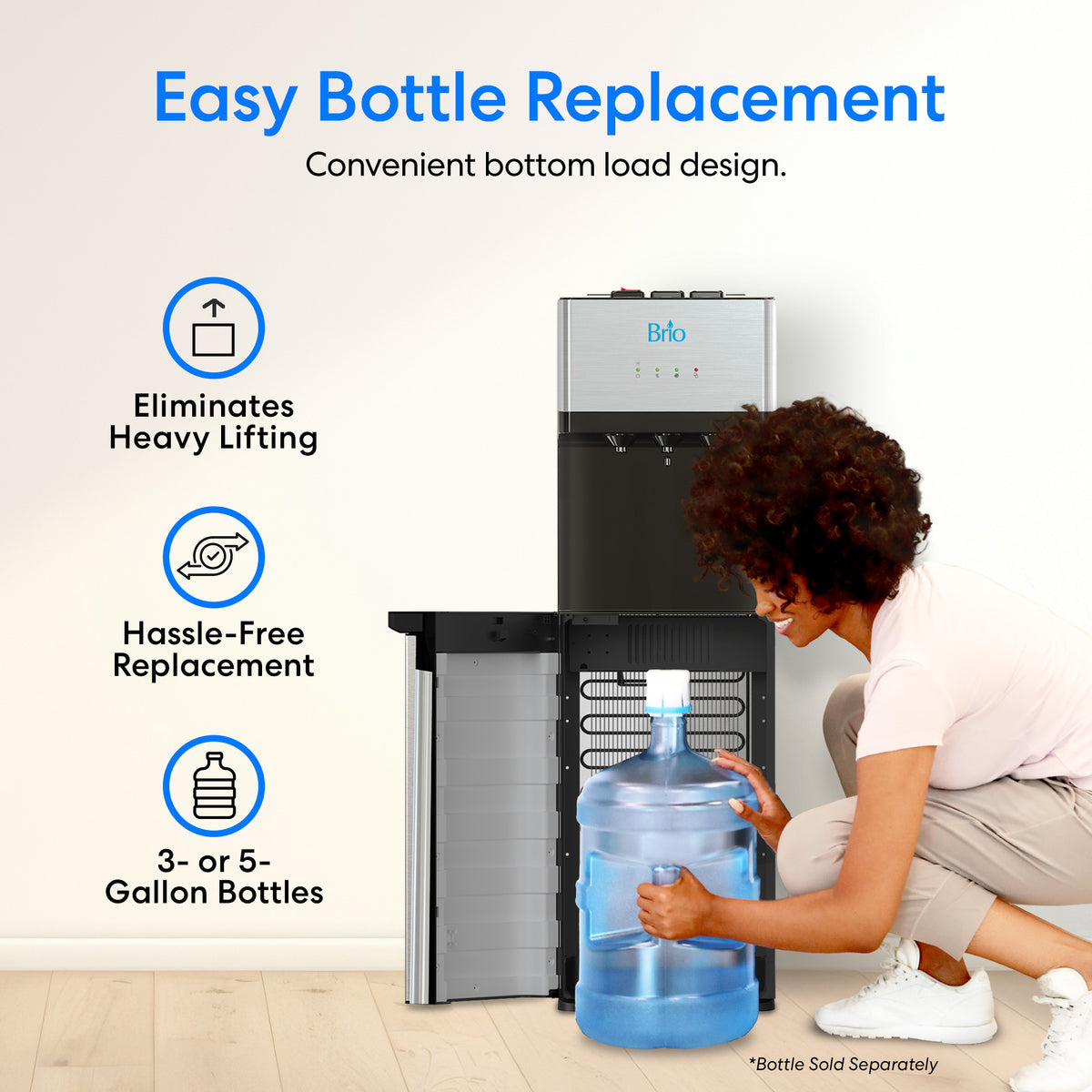 A woman kneels to easily place a large water bottle into the bottom compartment of the Stainless Steel Bottom Load Water Dispenser - 520. The text highlights hassle-free, easy bottle replacement that eliminates heavy lifting, fitting both 3- and 5-gallon bottles. This tri-temperature water cooler also features self-cleaning UV technology for added convenience and enhanced hygiene.