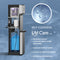 Cutaway view of the Stainless Steel Bottom Load Water Dispenser - Model 530 BL with self-cleaning technology, revealing internal components like the durable stainless steel reservoirs. Text highlights: reduces contaminants, improves taste, leaves no chemical residue, and minimizes maintenance. Background features water molecules graphic.