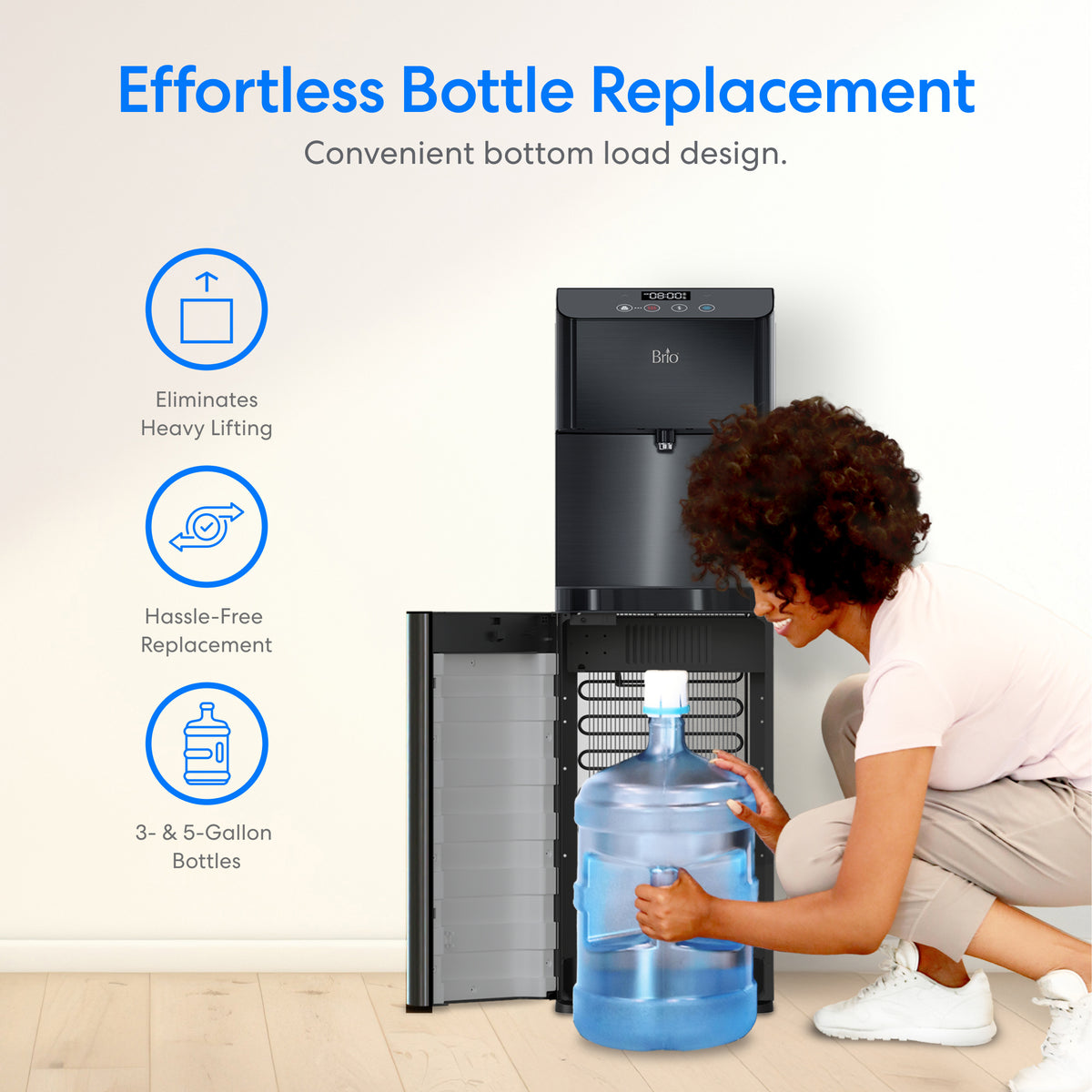 A person loads a large water bottle into the Black Stainless Bottom Load Water Dispenser - Moderna 720, featuring a sleek design. Effortless Bottle Replacement is highlighted, with features that eliminate heavy lifting and ensure hassle-free use for 3- and 5-gallon bottles—making it an ideal choice for anyone seeking the convenience of a self-cleaning water cooler.