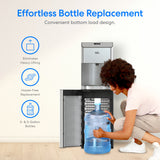 A woman loads a large bottle into the Brio Moderna Self-Cleaning Bottom Load Water Cooler. Text highlights effortless, hassle-free bottle replacement with no heavy lifting, plus support for 3- and 5-gallon bottles.