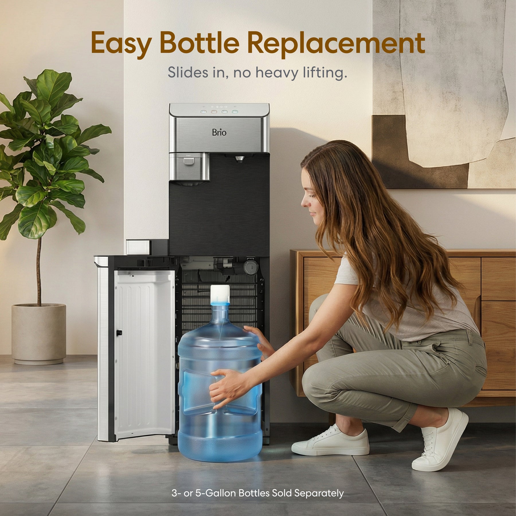 A woman slides a large blue water bottle into the Brio Moderna Coffee Maker & Bottom Load Water Cooler Dispenser in a modern, well-lit room. Text above reads: Easy Bottle Replacement—slides in, no heavy lifting.