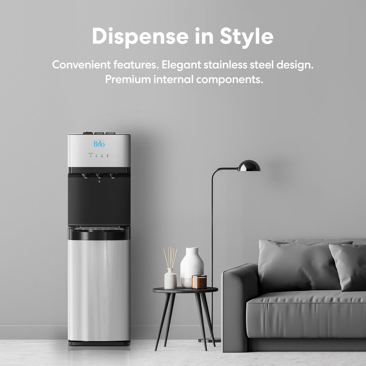 A modern living room featuring the Stainless Steel Ultrafiltration Bottleless Water Dispenser - Model 520, a black floor lamp, a gray couch, and a small decor table beneath text highlighting the stylish features of this water dispenser.