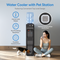 A woman gives water to her dog at the Top Load Water Dispenser with Built-In Pet Station - Model 320, which is black and features hot/cold water, no-plumbing installation, durable construction, and a convenient pet bowl dispenser as shown by the icons.