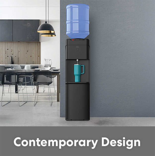 Black water cooler with blue water container and cup in a modern kitchen setting.