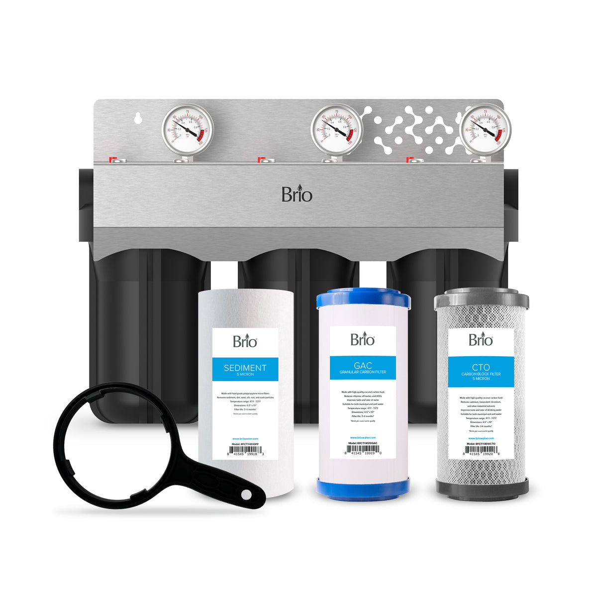 The 3-Stage Whole House Filtration System - 10" Multi-Purpose includes sediment, GAC, and CTO filters, a filter housing wrench, and a metal panel with pressure gauges.
