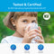 A young girl with short brown hair drinks water from a glass, while text highlights that the 26″ High Capacity All-in-One Under Sink Water Filter is Tested & Certified by NSF International Against Standards 42 & 372. Icons showcase features such as lead free, reduced impurities, and trusted hydration—ideal benefits for your home’s under sink water filtration system.