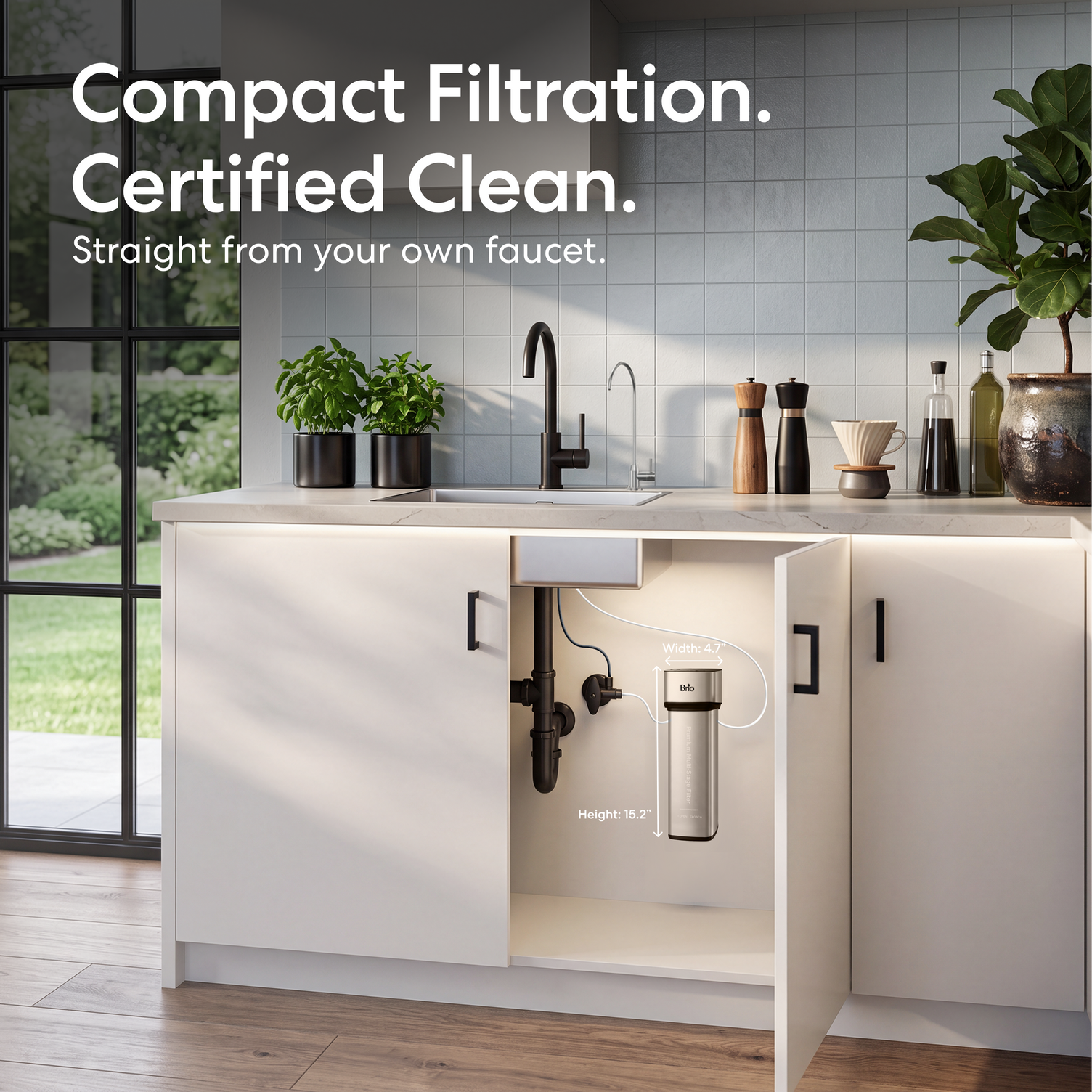 The 11″ Premium Under Sink Filter PFAS-Reduction System with stainless steel faucet mounted on a white kitchen cabinet door, shown in a bright modern kitchen with the text 'Compact Filtration. Certified Clean.