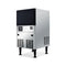 The Monarch 80 Lb Capacity Ice Machine with 33 Lb Storage Bin features a black top, digital control panel, vents, and adjustable legs—ideal as an undercounter stainless steel ice maker for any business.