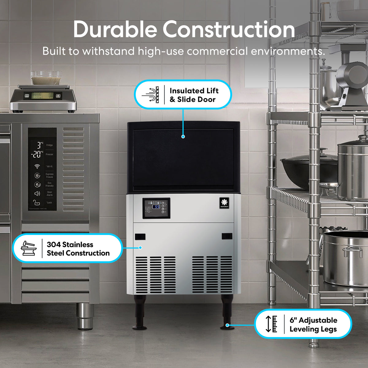 A commercial kitchen features the Monarch 80 Lb Capacity Ice Machine with 33 Lb Storage Bin, stainless steel blast chiller, insulated lift-and-slide door, and adjustable legs—all surrounded by shelves and other durable appliances.
