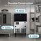 A commercial kitchen features the Monarch 80 Lb Capacity Ice Machine with 33 Lb Storage Bin, stainless steel blast chiller, insulated lift-and-slide door, and adjustable legs—all surrounded by shelves and other durable appliances.