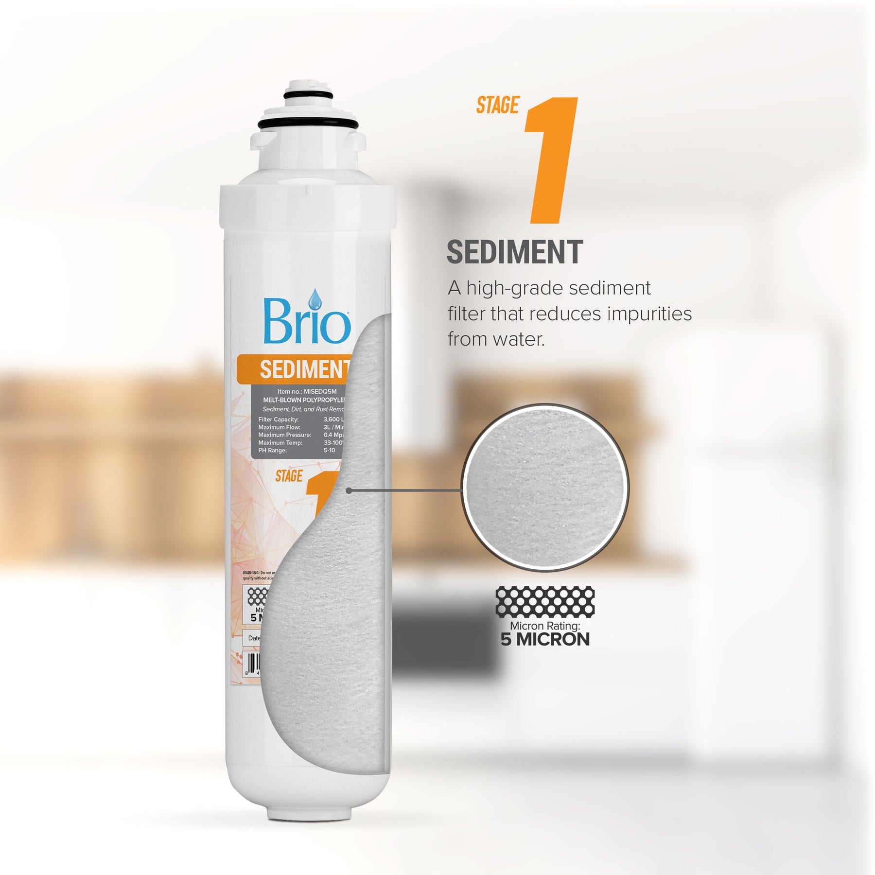 The Brio Stage 1 Sediment Filter – CLPOURO420SCV2 stands upright with a magnified view highlighting its 5-micron filtration, effectively reducing water impurities. A blurred kitchen forms the background.