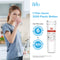 A woman drinks water in a kitchen next to a pitcher. Text: “1 NSF-certified 836848 Refrigerator Filter saves 3200 plastic bottles—lasting 6 months or 300 gallons.” Image of Brio 836848 Refrigerator Filter for Fisher & Paykel®/Amana® on right.