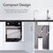 A modern kitchen features a built-in oven, sink, and an Amphora Series Ultrafiltration Under Sink Filtration System by Brio with plumbing connections. Text above reads "Compact Design" and highlights easy installation and multi-stage filter changes.