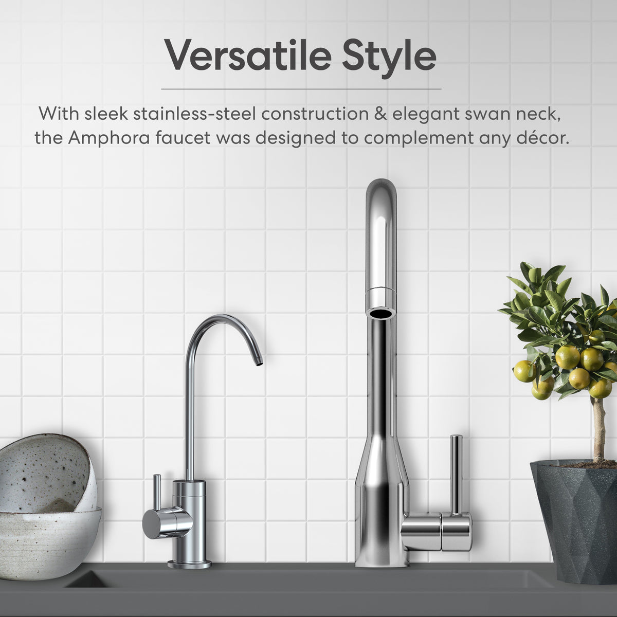 Modern kitchen sink featuring two sleek stainless-steel faucets, stylish bowls, a potted olive tree, and the compact Ultrafiltration Under Sink Filtration System – Amphora Series, set against a white tile backsplash.