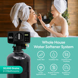 Brio 32000 grain whole house water softener system with a woman and child in a bathroom setting.