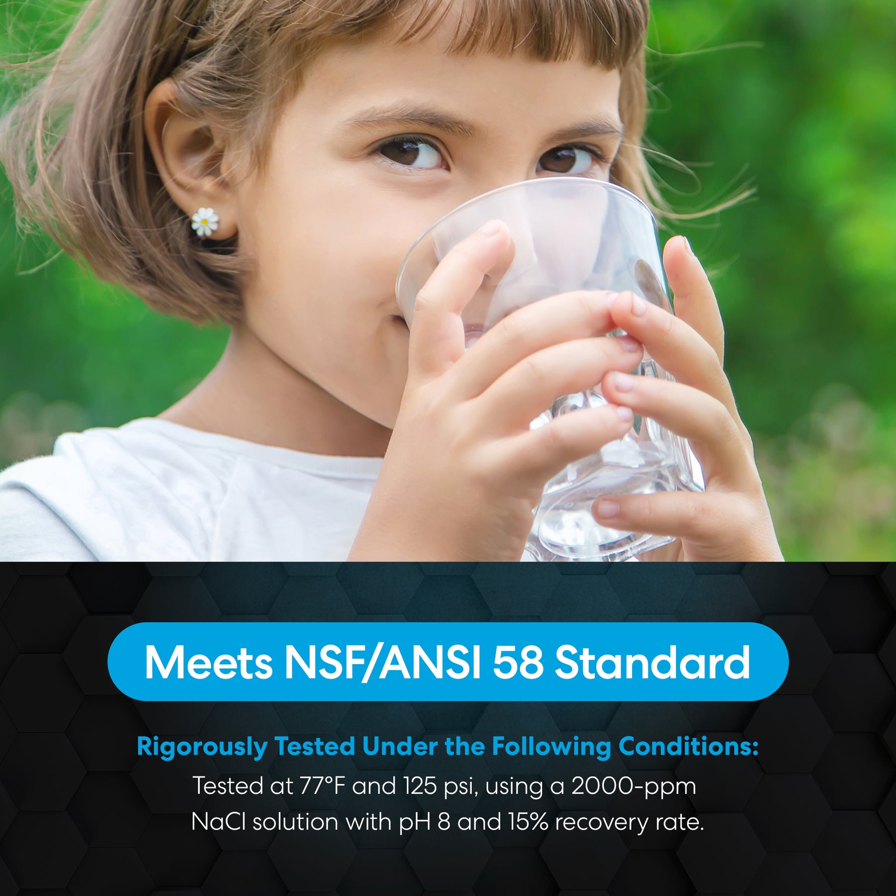 A young girl with short brown hair drinks purified water from a glass. Text below reads: Purified by DuPont FilmTec Commercial Reverse Osmosis Membrane 2750 GPD—meets NSF/ANSI 58, rigorously tested at 77°F and 125 psi.