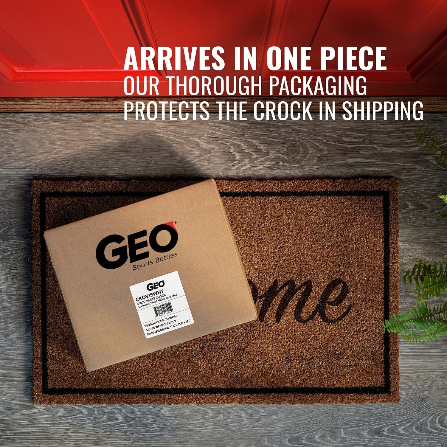 A cardboard box labeled GEO Porcelain Ceramic Crock Water Dispenser w/ Stand – Black sits on a brown doormat by a red door. Text above reads: ARRIVES IN ONE PIECE. OUR THOROUGH PACKAGING PROTECTS YOUR DISPENSER IN SHIPPING.