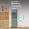 In a modern kitchen beside wooden cabinets, the Bottom Load Bullet Ice & Hot/Cold Water Stainless Steel Dispenser – Moderna 720 Ice stands tall at 43.3 inches (110 cm), making it the tallest model available. Its sleek silver design features a convenient bottom load water cooler and bullet ice maker, blending style with practicality for effortless hydration and easy use.