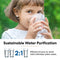 A young girl drinks water from a glass outdoors. Below, the text reads: Sustainable Water Purification with the G20 Series Natural Reverse Osmosis Undersink Filtration System—efficient 2:1 pure-to-drain ratio for reduced water waste.